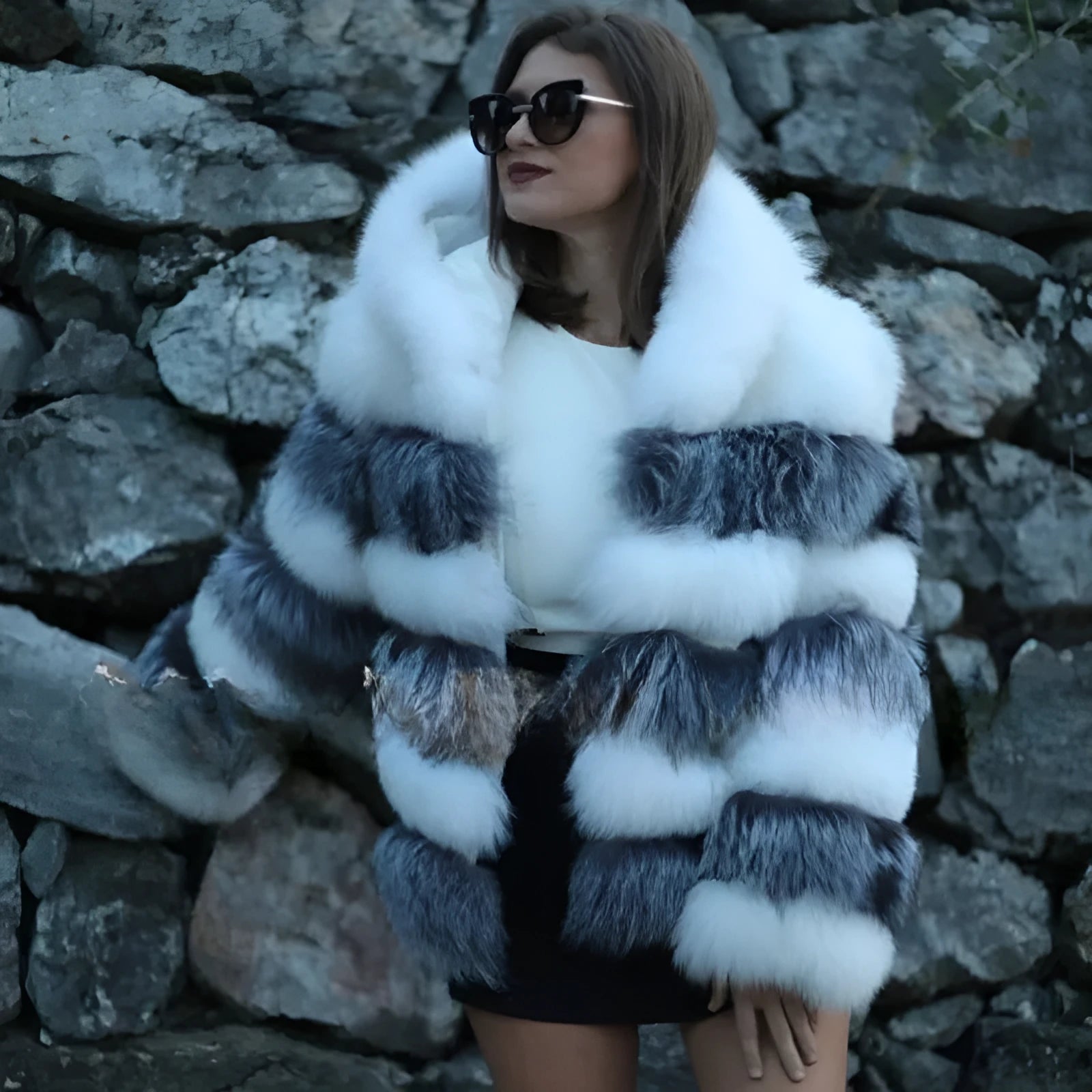Loose hooded women's coat in artificial fur, shown in brown and white silver fox colours.