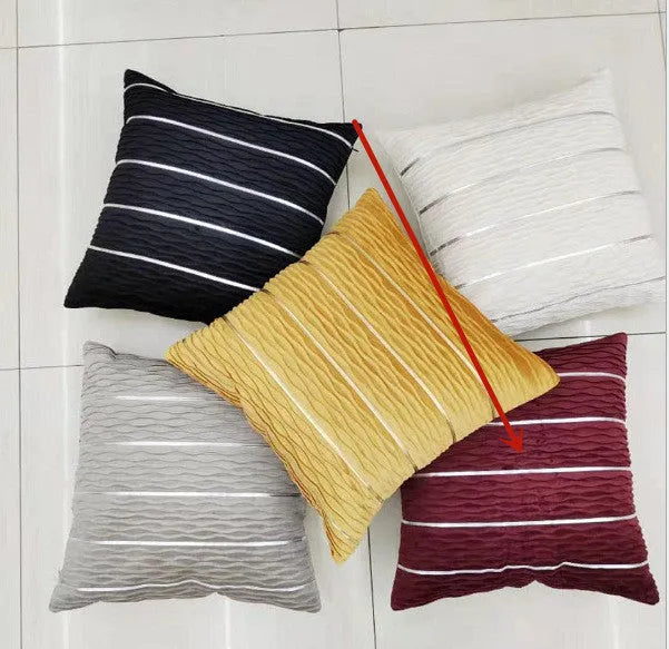 Square striped velvet pillow cover for sofa in multiple colour options on a grey background.