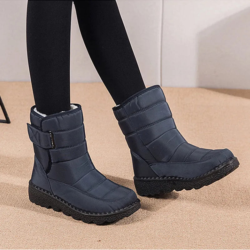 Women's waterproof snow boots with canvas upper, PU sole, buckle closure, and belt decoration