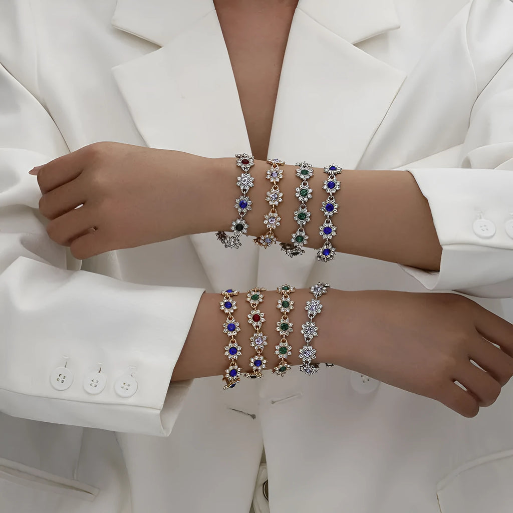 Floral zinc alloy bracelet in electroplated gold and silver colour variants with crystal and diamond effects