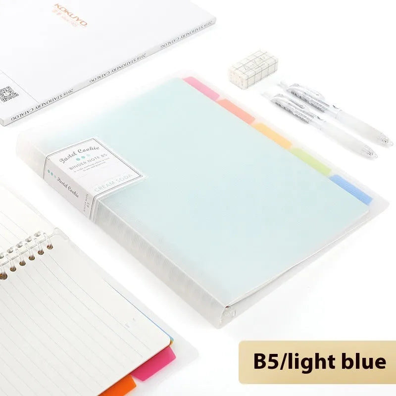 Refillable loose-leaf spiral notebook in B5 size with a pastel blue PP cover and lined pages.