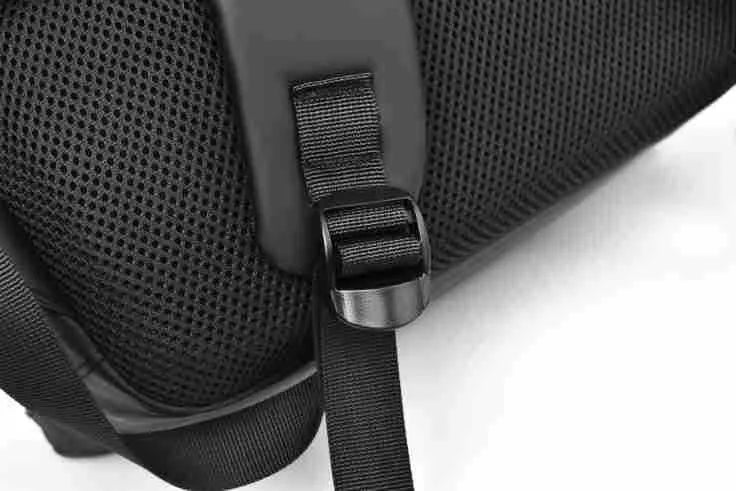 Large black waterproof backpack made from PU leather with sewing thread detailing