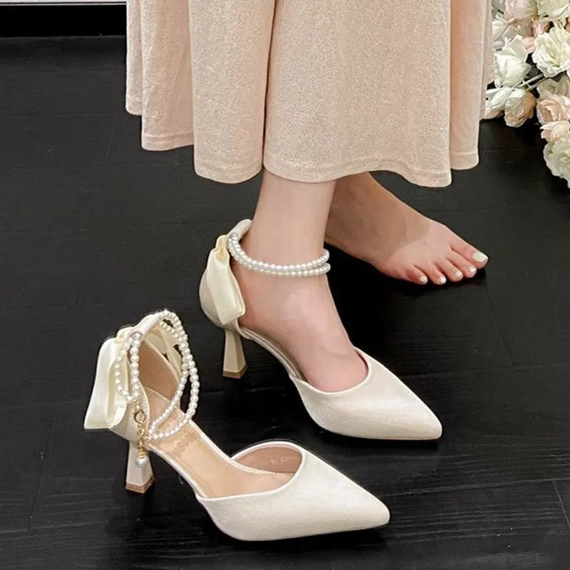 Women's fairy bow high heels in apricot with 6cm wine glass heel, side view
