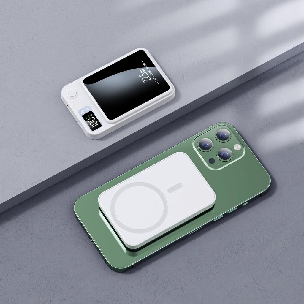 Wireless MagSafe power bank in black, showing industrial style plastic shell and compact rectangular shape.