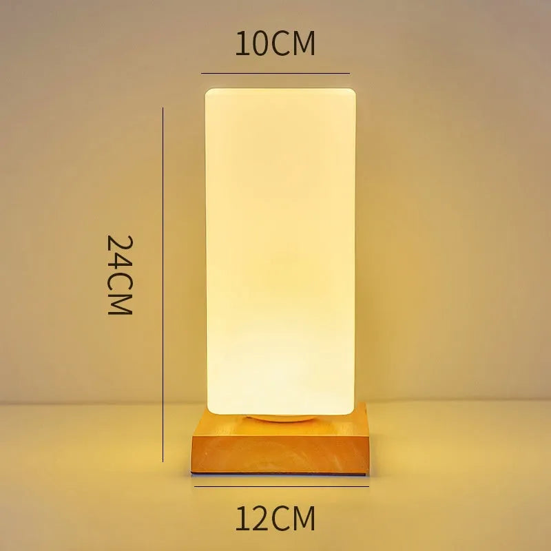 Nordic solid wood base USB table lamp in a choice of cube, column, cylinder, or ball shapes with touch dimming.