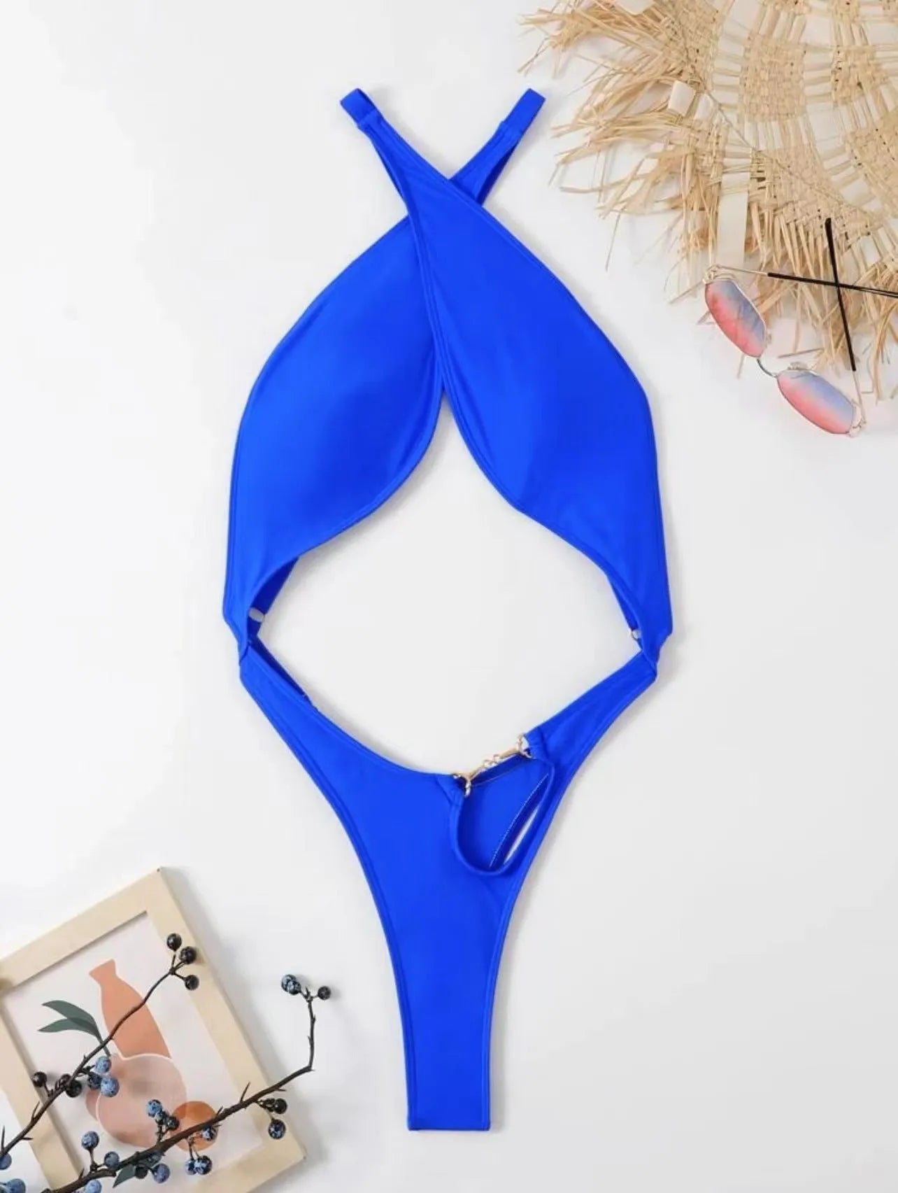 Blue solid colour women's one-piece swimsuit on a mannequin.