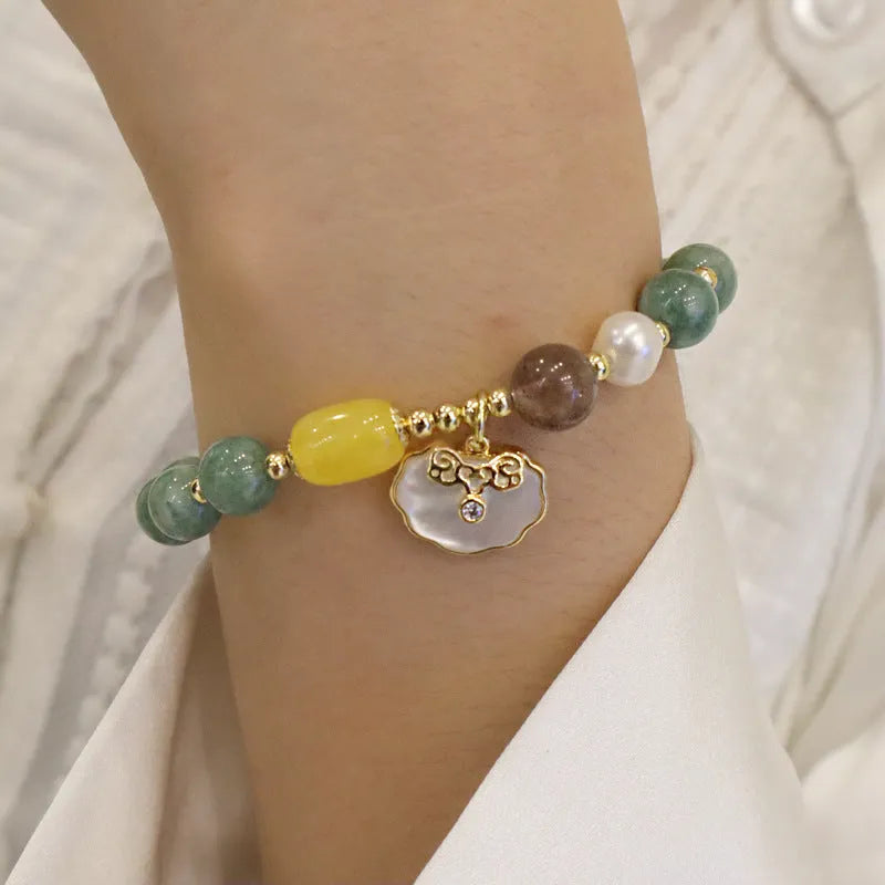 Women's green jade shell bracelet with adjustable fit in casual style