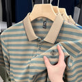 Man wearing a red mosaic stripe short sleeve casual polyester shirt.