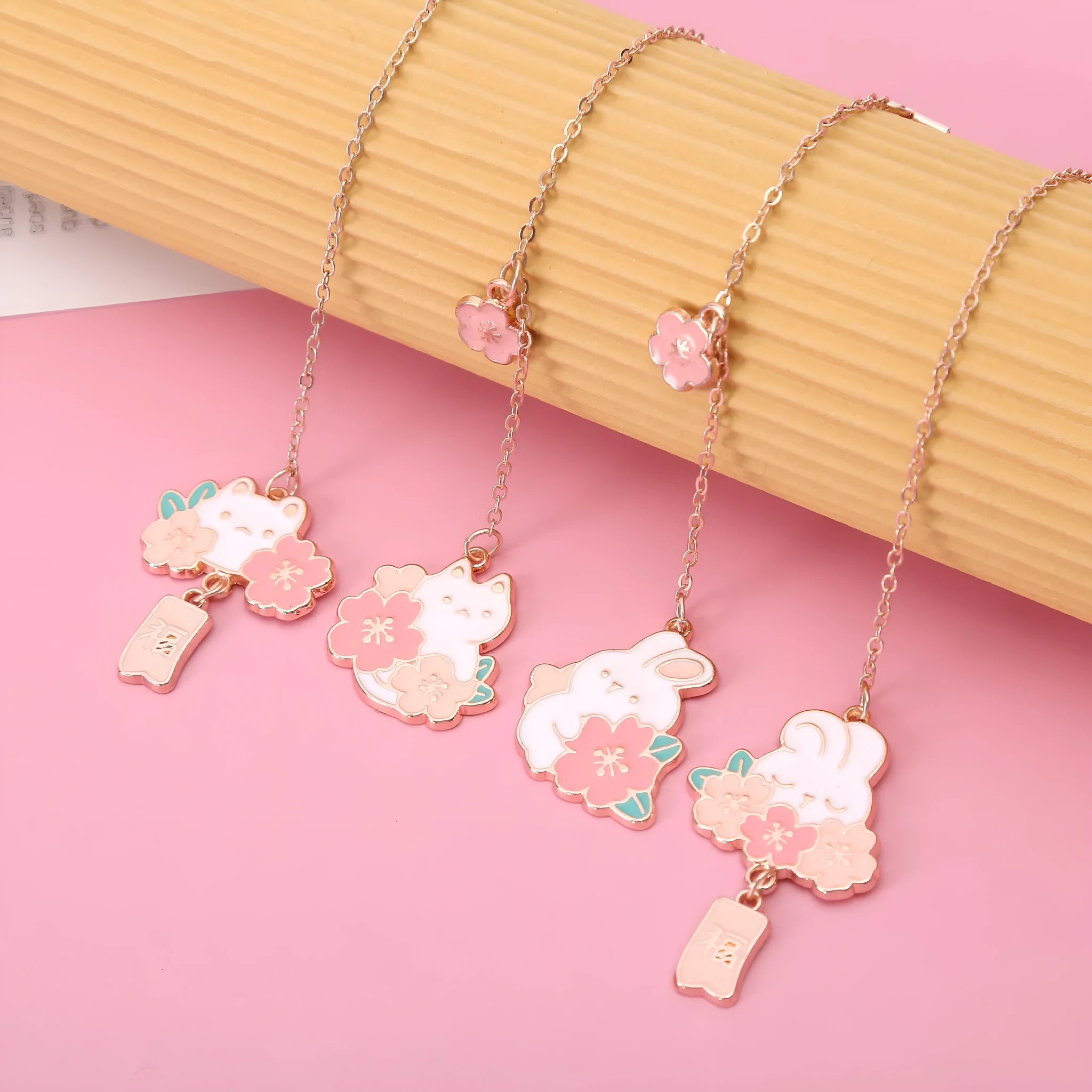Metal pendant bookmark with engraved cherry blossom cat design, small decorative charm for book marking