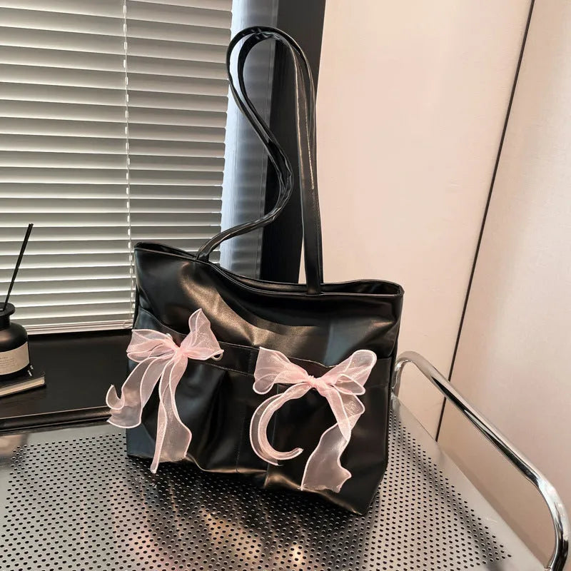 Black and pink college style bow tote bag with large capacity and double shoulder straps.