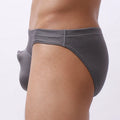 Men's loose fit transparent nylon underwear in blue, shown on a size chart.