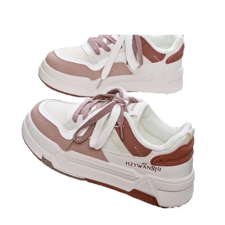 Beige children's board shoes with cross-body straps, thick rubber sole, and front laces on a neutral background.