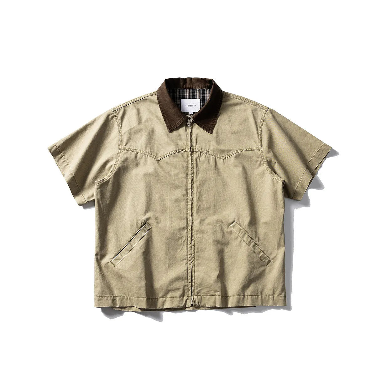 Loose fit grey washed denim short sleeve shirt overalls on a hanger