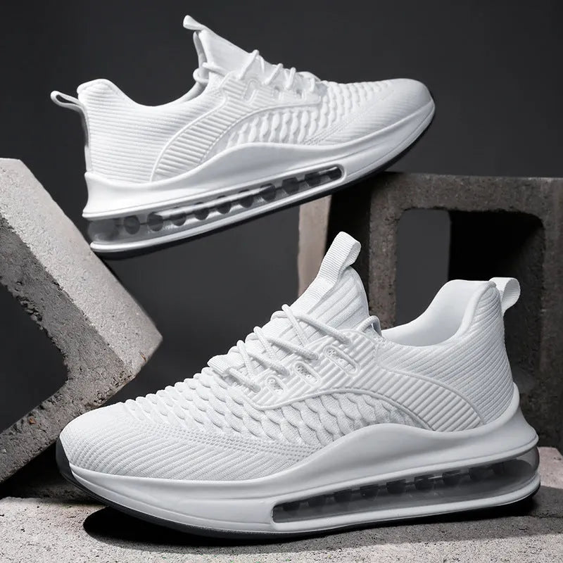 Men's black low-top mesh running shoes with a round toe and lace-up front on a white background.
