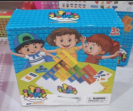 Plastic balance stacking game with colourful building blocks on chassis for family play