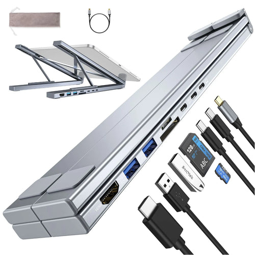 Aluminium folding laptop stand with integrated 8-in-1 docking hub ports and a short cable.