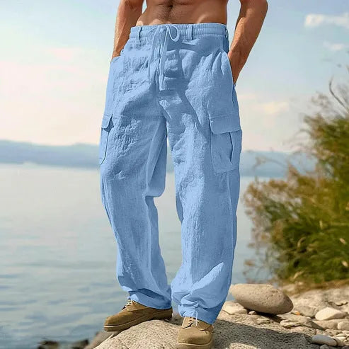 Men's loose cotton wide-leg casual trousers in solid colours showing mid-waist and relaxed fit