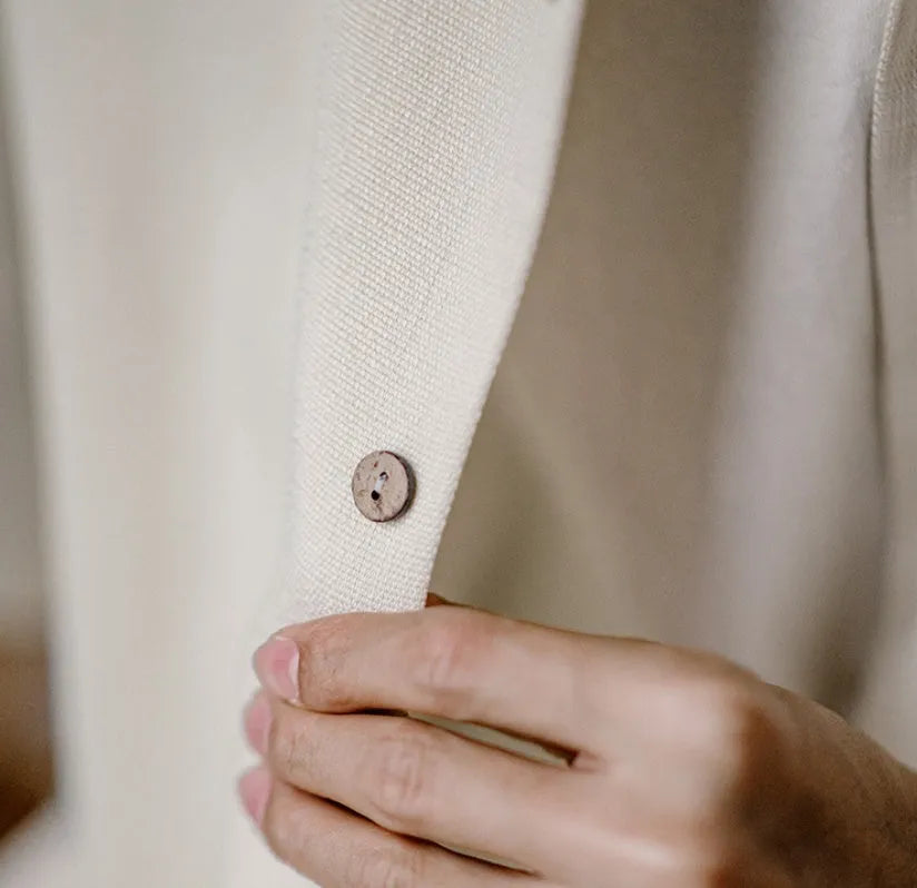 Men's light apricot shirt with bamboo leaf pattern and a Cuban collar on a short sleeve design.