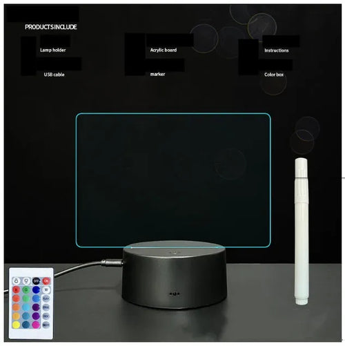 Black 3D acrylic message board night light with remote control and stylus on desk.