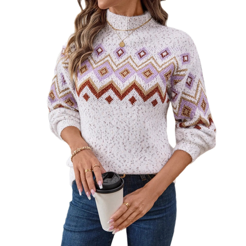 White half turtleneck loose sweater with a geometric jacquard pattern and long sleeves.