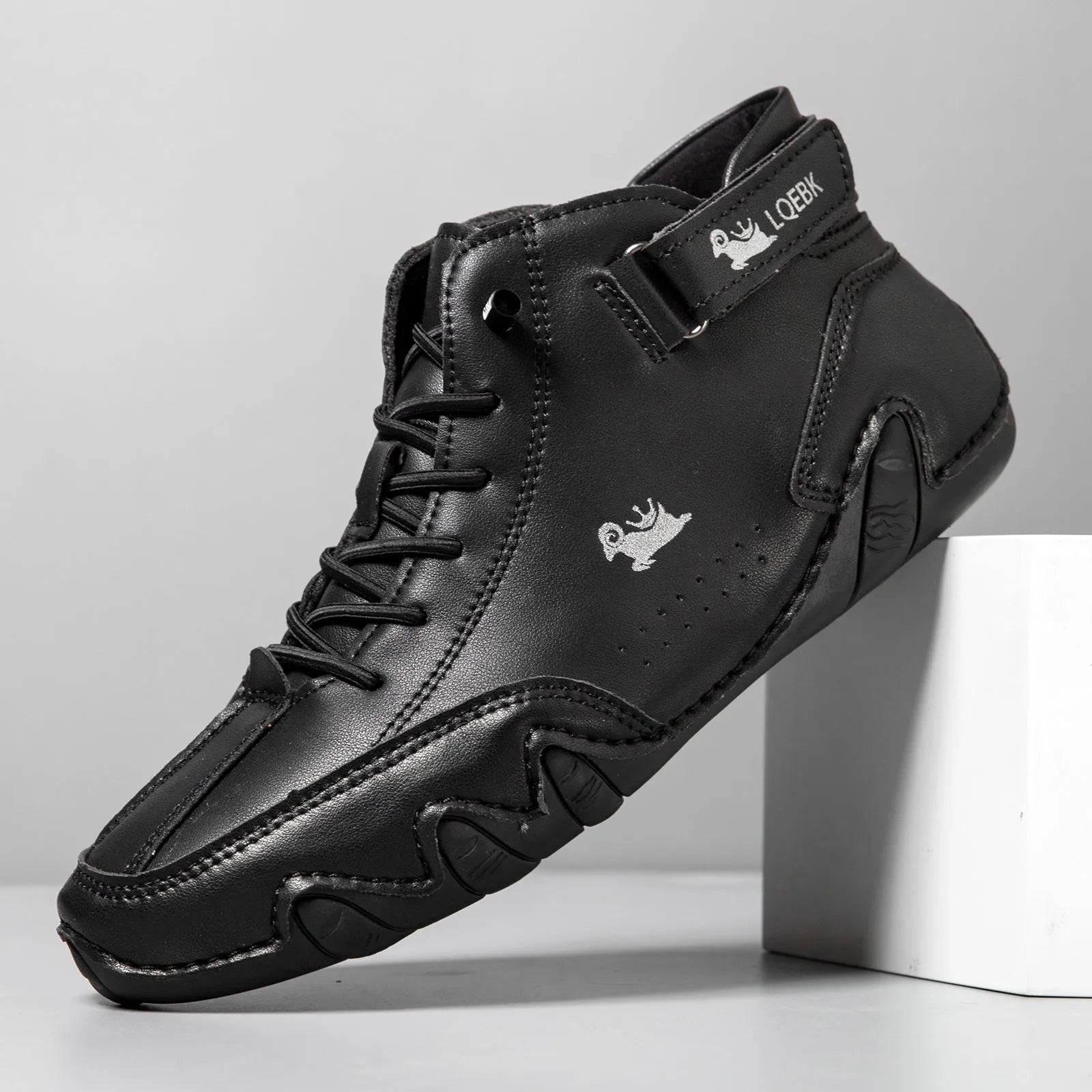 Men's brown high-top casual Martin boots with round toe and flat rubber sole.
