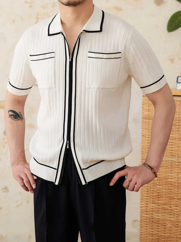 Slim fit black lapel polo shirt with short sleeves on a hanger.