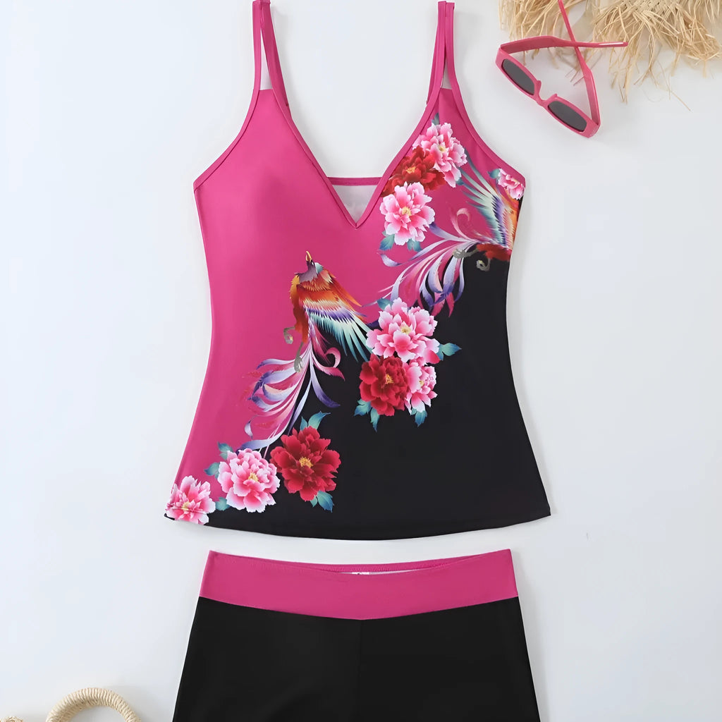 Women's plus size black and rose red two-piece swimsuit bikini set on a mannequin.