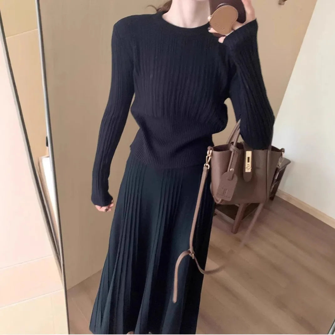 Women's dark grey knitted two-piece dress suit with 3D pattern and ethnic collage stitching.