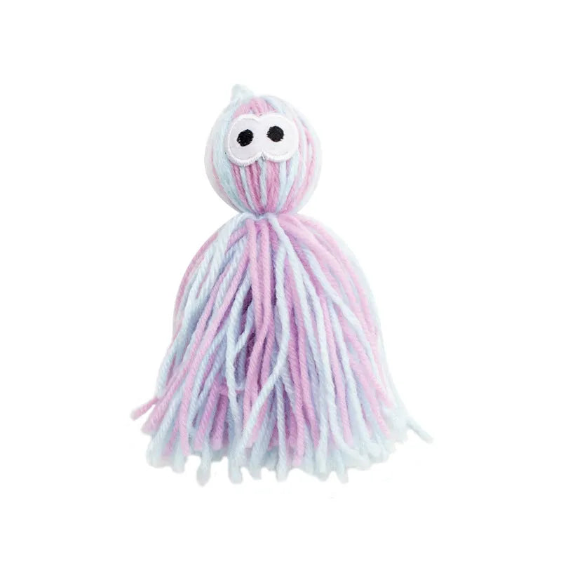 Four wool cat balls with hanging loops and teaser stick in blue grey, pink and blue, and pink purple colours