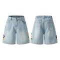 Retro loose-fit washed cotton shorts in camouflage with a zipper pocket.