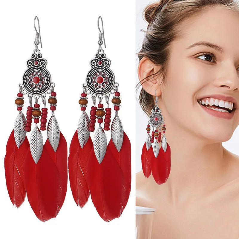 Handmade feather pattern bohemian earrings in multiple colours with leaf design detail