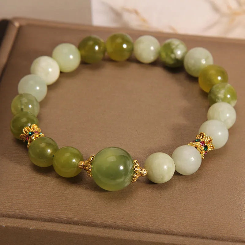 Women's original design bracelet made from green Xiuyan jade in a light luxury sweet Mori style.