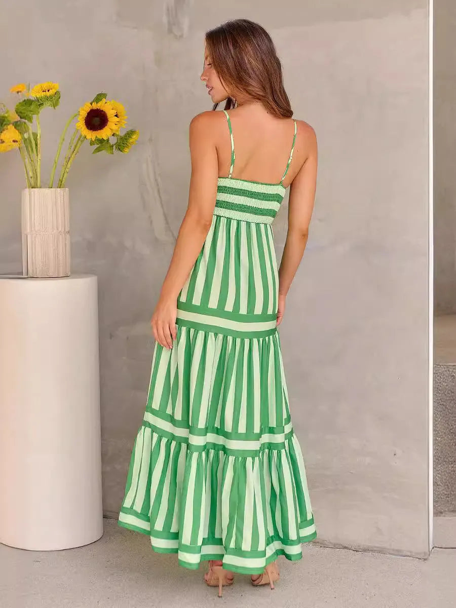 Long striped backless summer dress with square neckline and side pockets on a mannequin