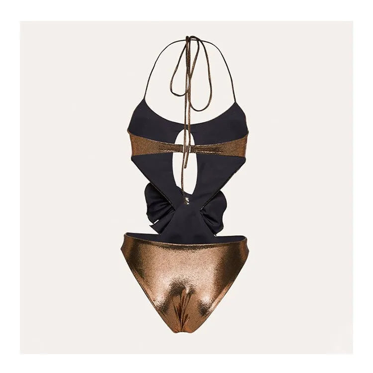 Gold handmade halter neck one-piece swimsuit with hollow-out detailing on a mannequin.