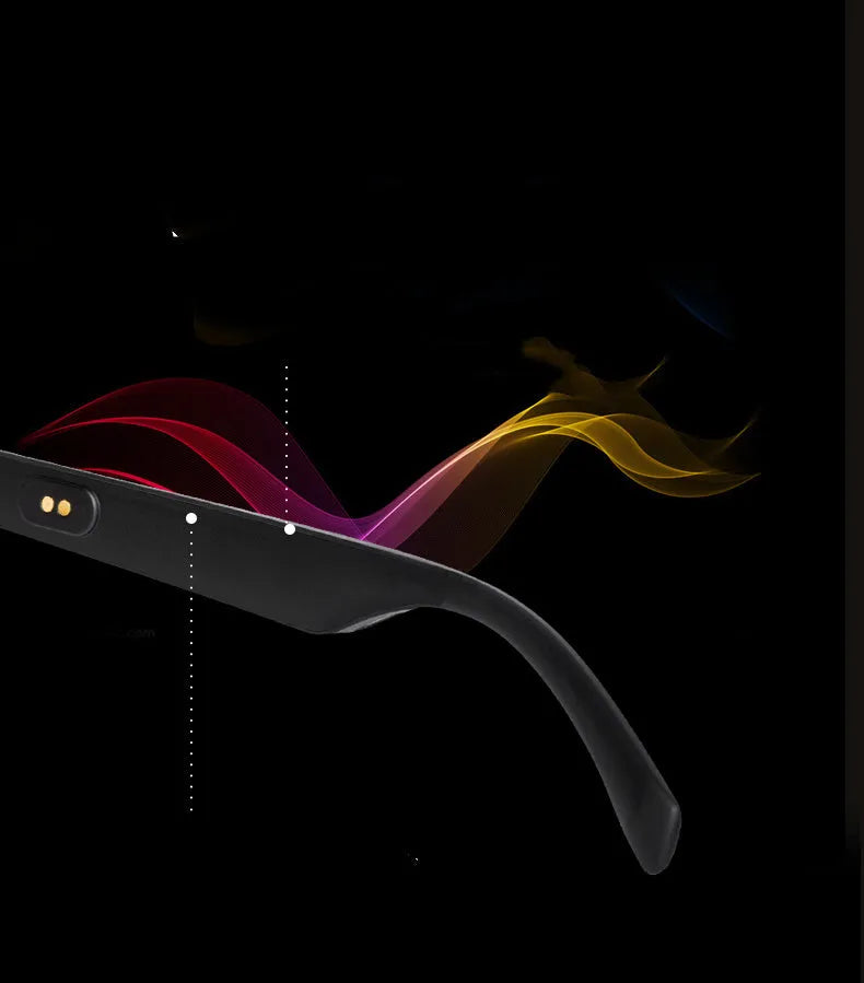 Smart Bluetooth audio glasses with dark lenses on a table, showing temple speakers and a charging case.