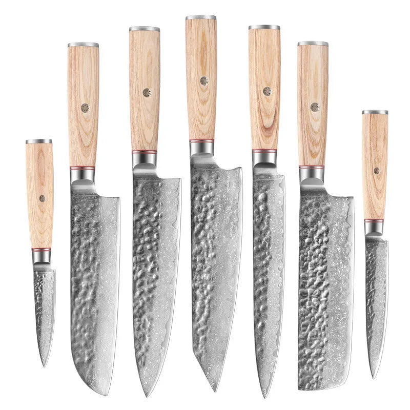 Damascus steel kitchen knife set of 7 with patterned blades and wooden handles on a dark surface