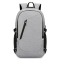 Blue unisex Oxford cloth computer backpack with a street style design, shown from the side.