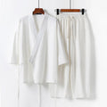 Cardigan-style Hanfu two-piece suit in cotton and linen, shown in apricot colour with shirt-style jacket and trousers.