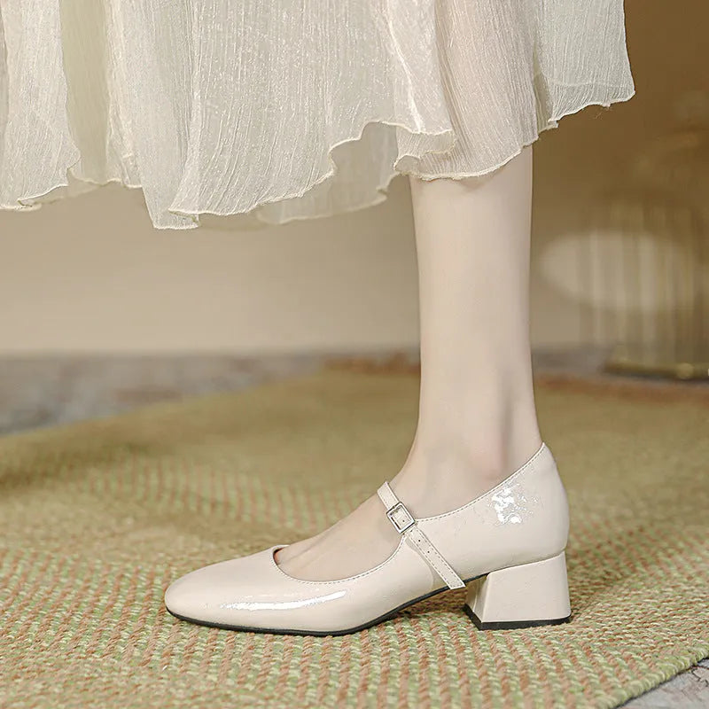 Women's square toe patent leather Mary Jane shoes with pearl detail and mid heel in apricot colour