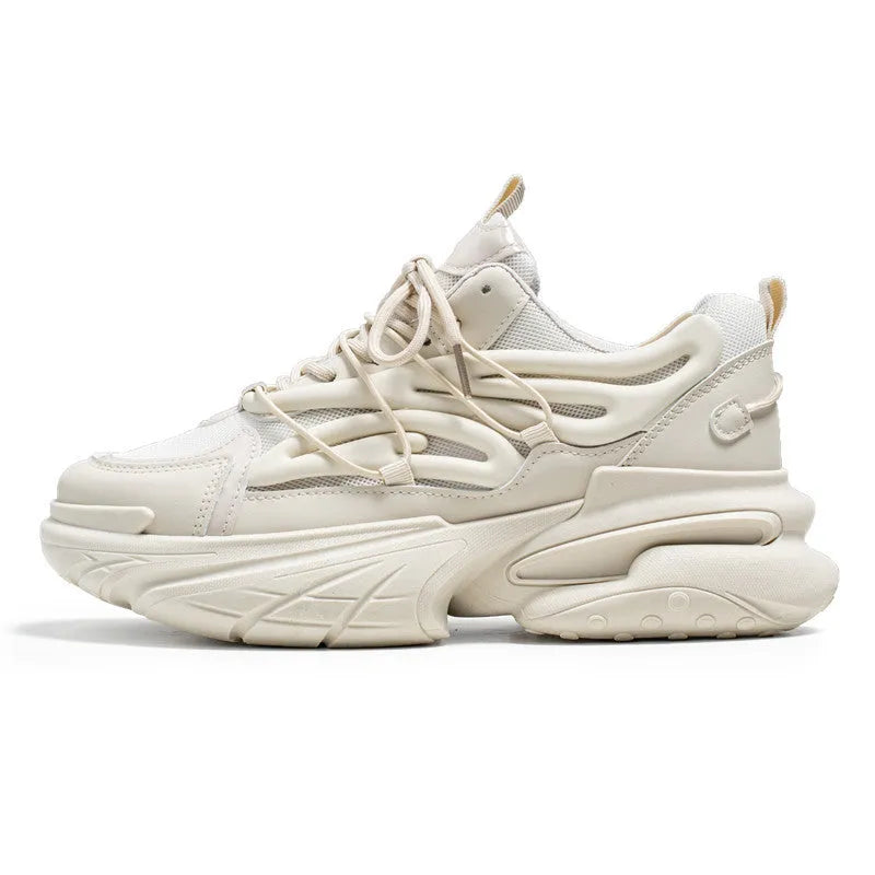 Men's low-top sneakers in beige with mesh upper, rubber sole, and front lace-up design on a white background.