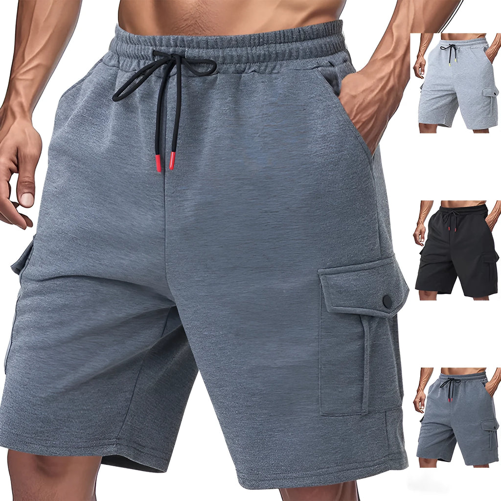Men's loose-fit grey terry fabric cargo shorts with multiple pockets on a plain background.