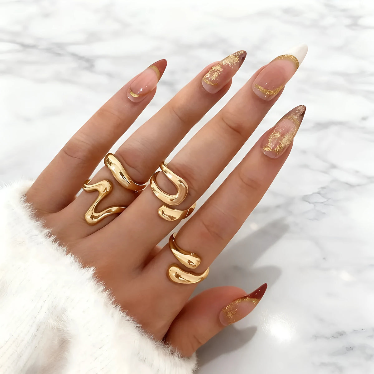 Open multi-piece ring set in Gold or Silver electroplated metal with geometric shape