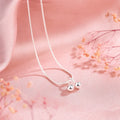 Silver cherry necklace for women on a snake bone chain, adjustable length.