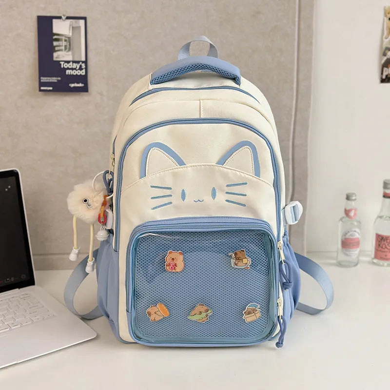 Korean cartoon backpack in multiple colours with curved shoulder straps and badge pendant options