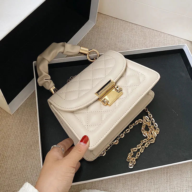 Korean style purple women's shoulder bag with chain strap showing front view