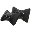 Black quilted diamond pattern car headrest pillow for cervical neck support.