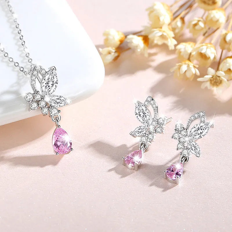 Women's silver butterfly stud earrings with crystal details on 925 sterling silver posts