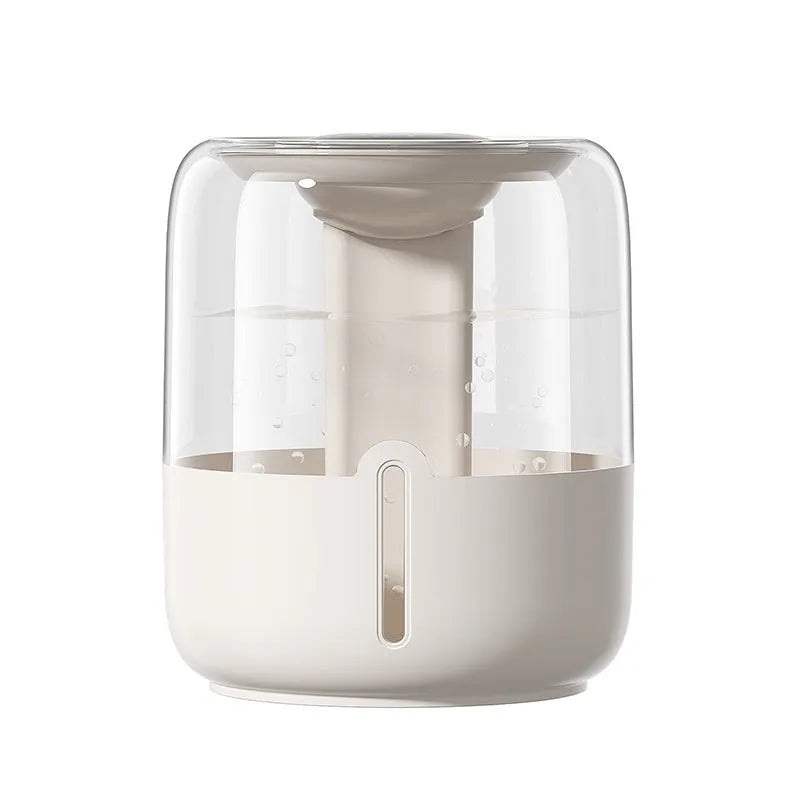 Round beige USB-powered humidifier with dual spray nozzles, a front display, and control gear.