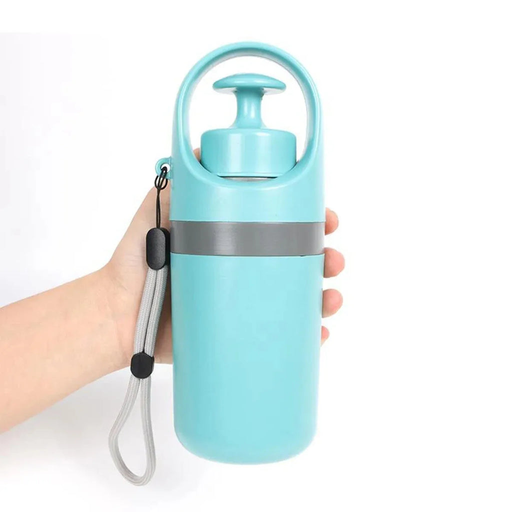 Blue and orange pet pooper scooper with retractable claw and built-in bag dispenser for outdoor dog waste collection