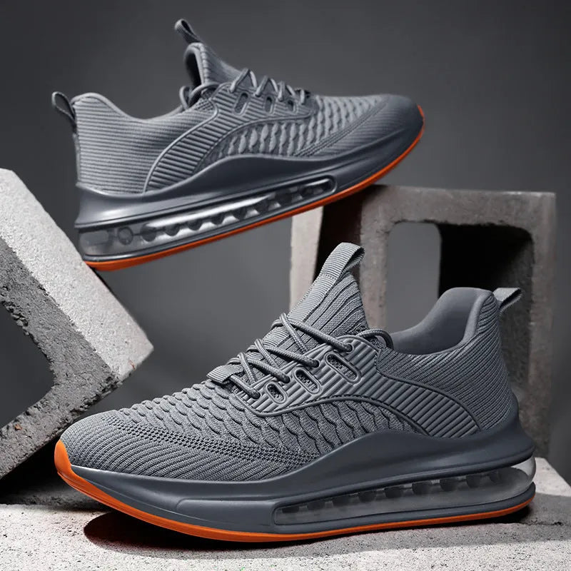 Men's black low-top mesh running shoes with a round toe and lace-up front on a white background.